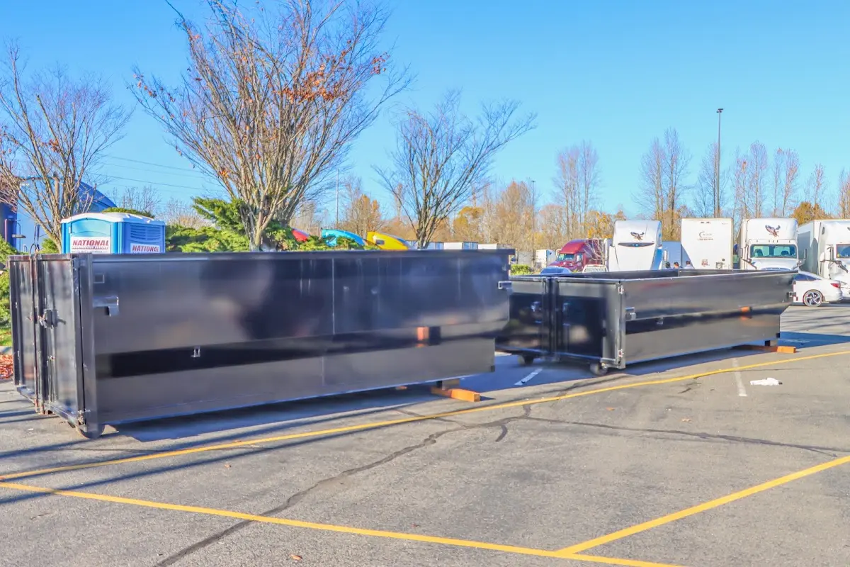 Professional dumpster rental service with roll-off container on residential driveway in Homer Glen